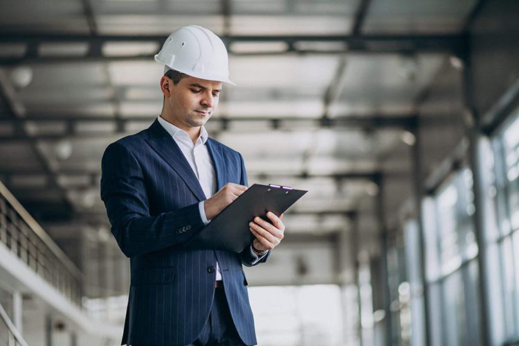 standing person with the clipboard in his hand